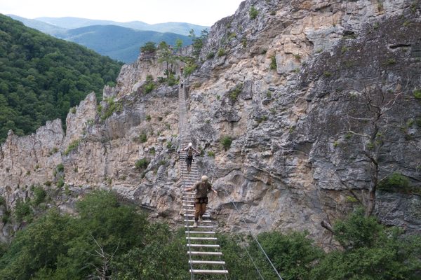 Crossing the Nelson Rocks Via Ferrata bridge