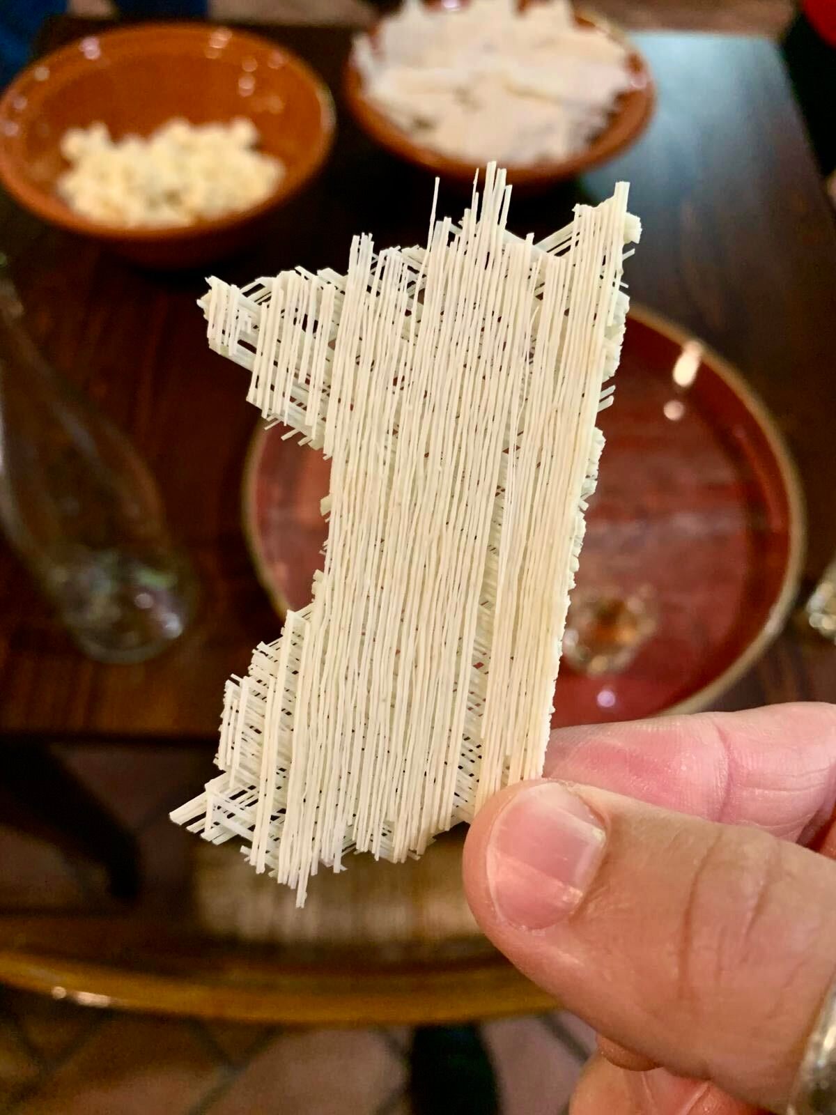 The intricate, crisscrossed strands are finer than angel hair.